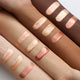 KIKO Milano Glow Fusion Gleam Dream Highlighter rozświetlacz do twarzy w płynie z aplikatorem gąbkowym