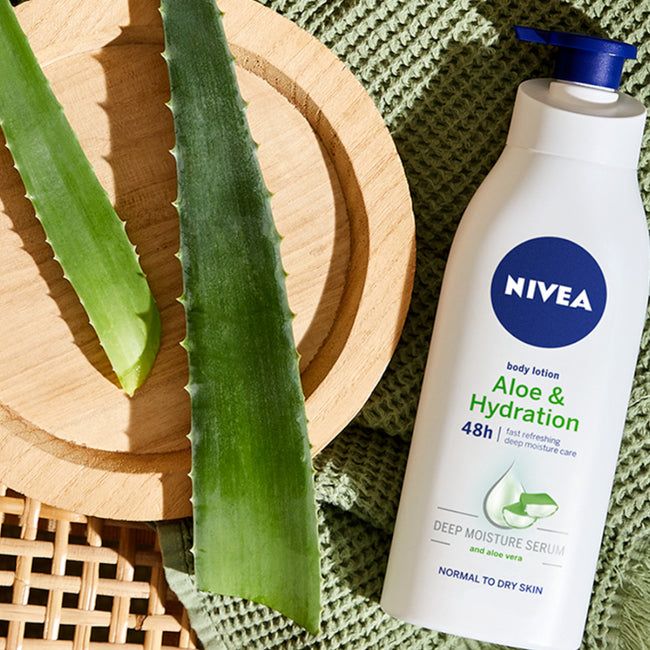 Nivea Nawilżająca Moc Serum łagodzący balsam do ciała z pompką 625ml