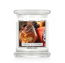 Kringle Candle Średnia świeca zapachowa z dwoma knotami Cognac & Leather 411g