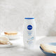 Nivea Beauty Collection zestaw antyperspirant roll-on 50ml + wygładzające mleczko do ciała 250ml + żel pod prysznic 250ml + wygładzający krem do rąk 100ml + kosmetyczka